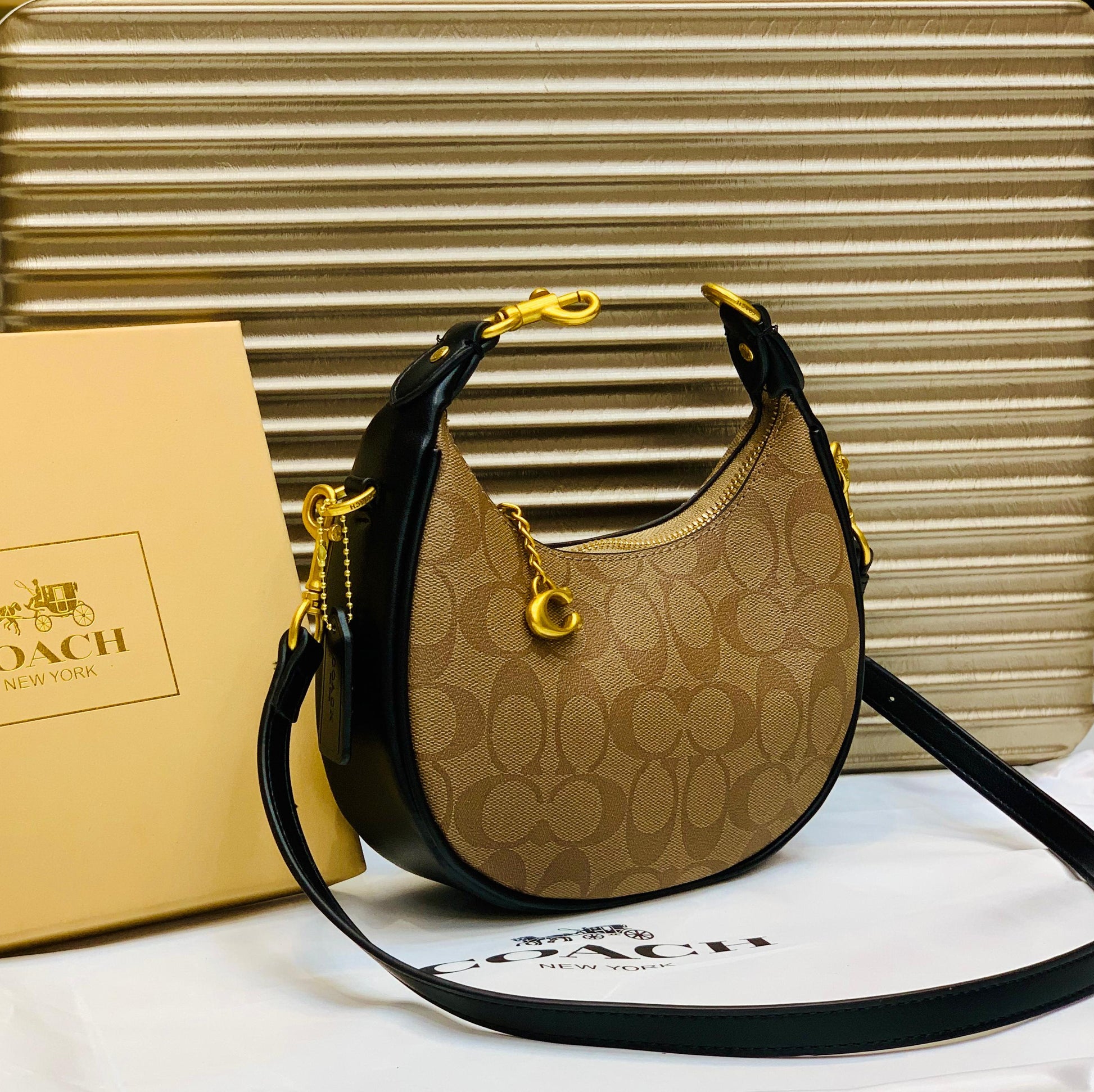 COACH MOON SHAPE CROSSBODY BAG