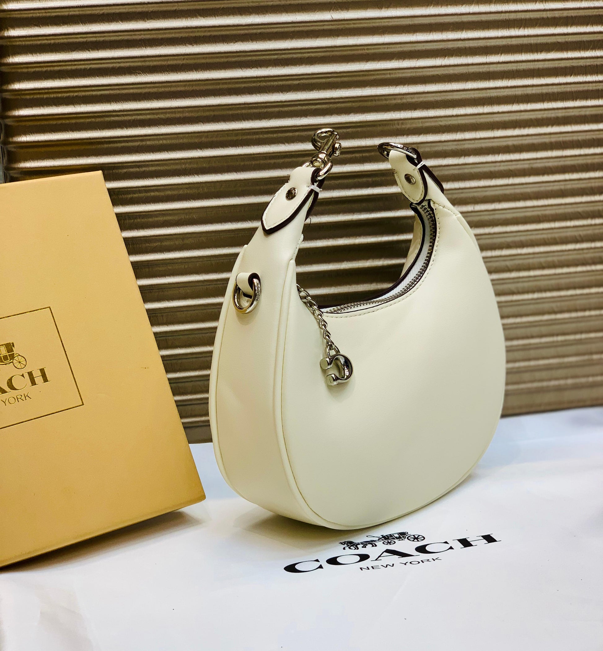 COACH MOON SHAPE CROSSBODY BAG