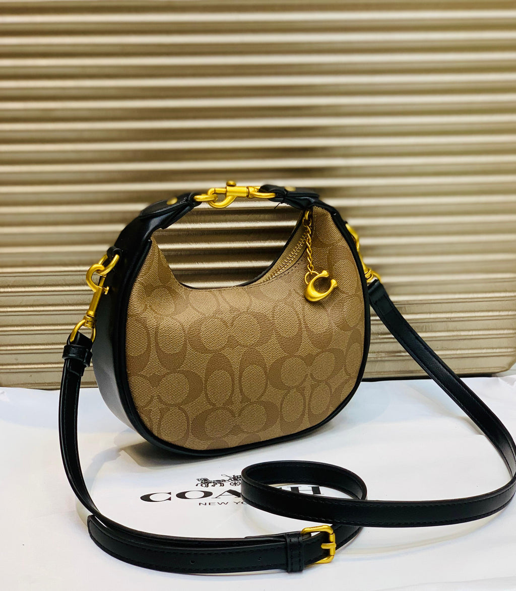 COACH MOON SHAPE CROSSBODY BAG