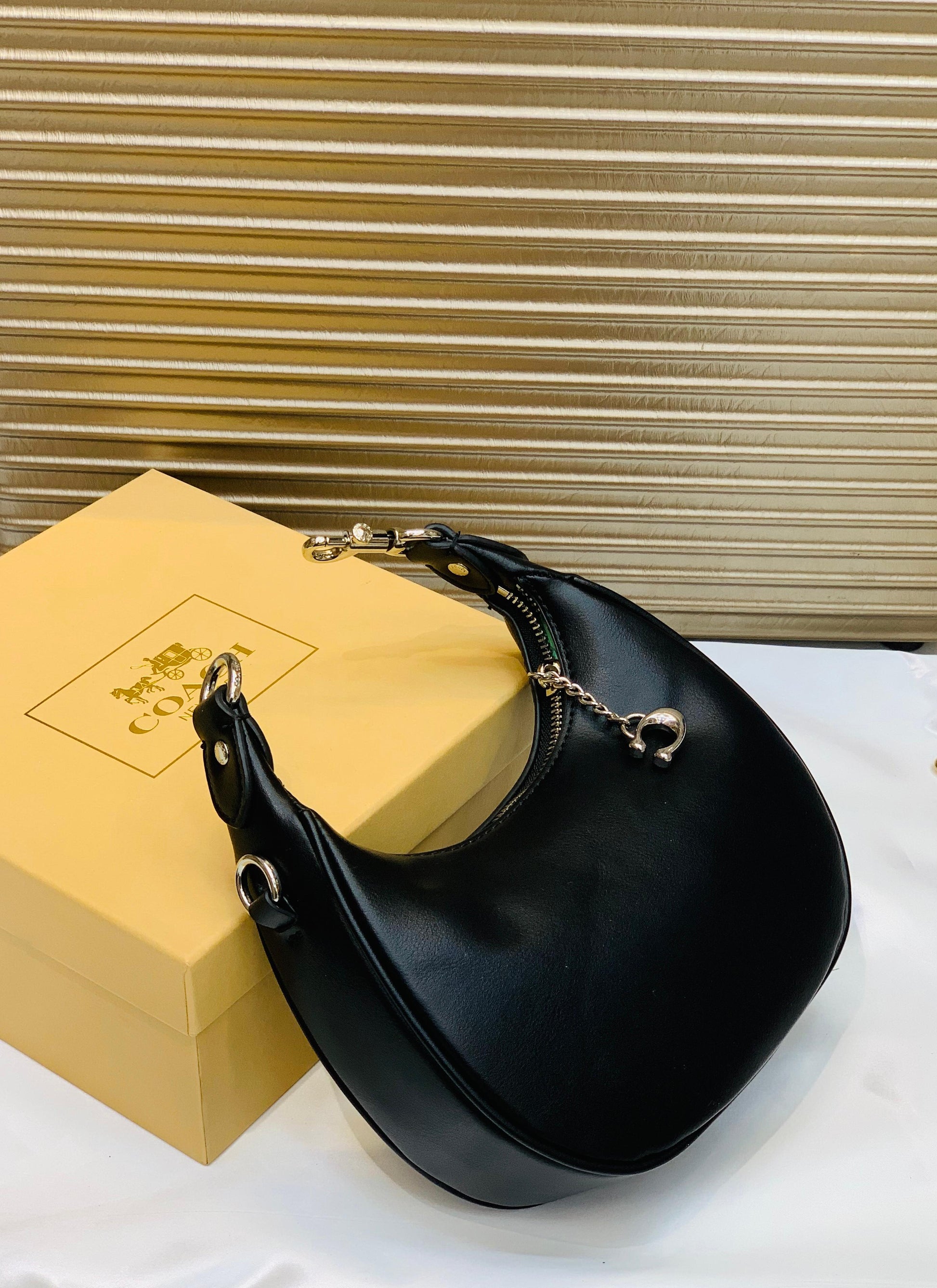 COACH MOON SHAPE CROSSBODY BAG