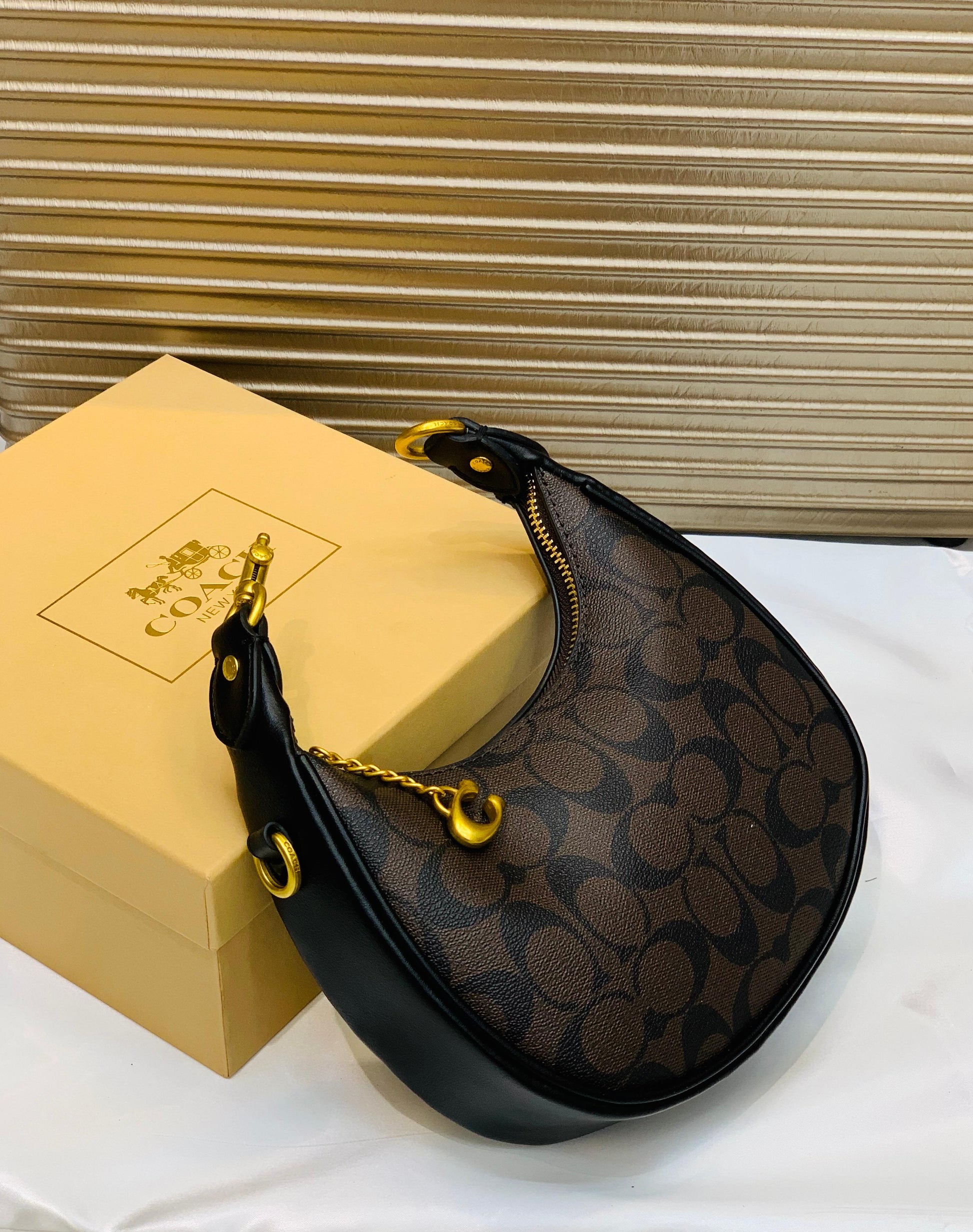 COACH MOON SHAPE CROSSBODY BAG