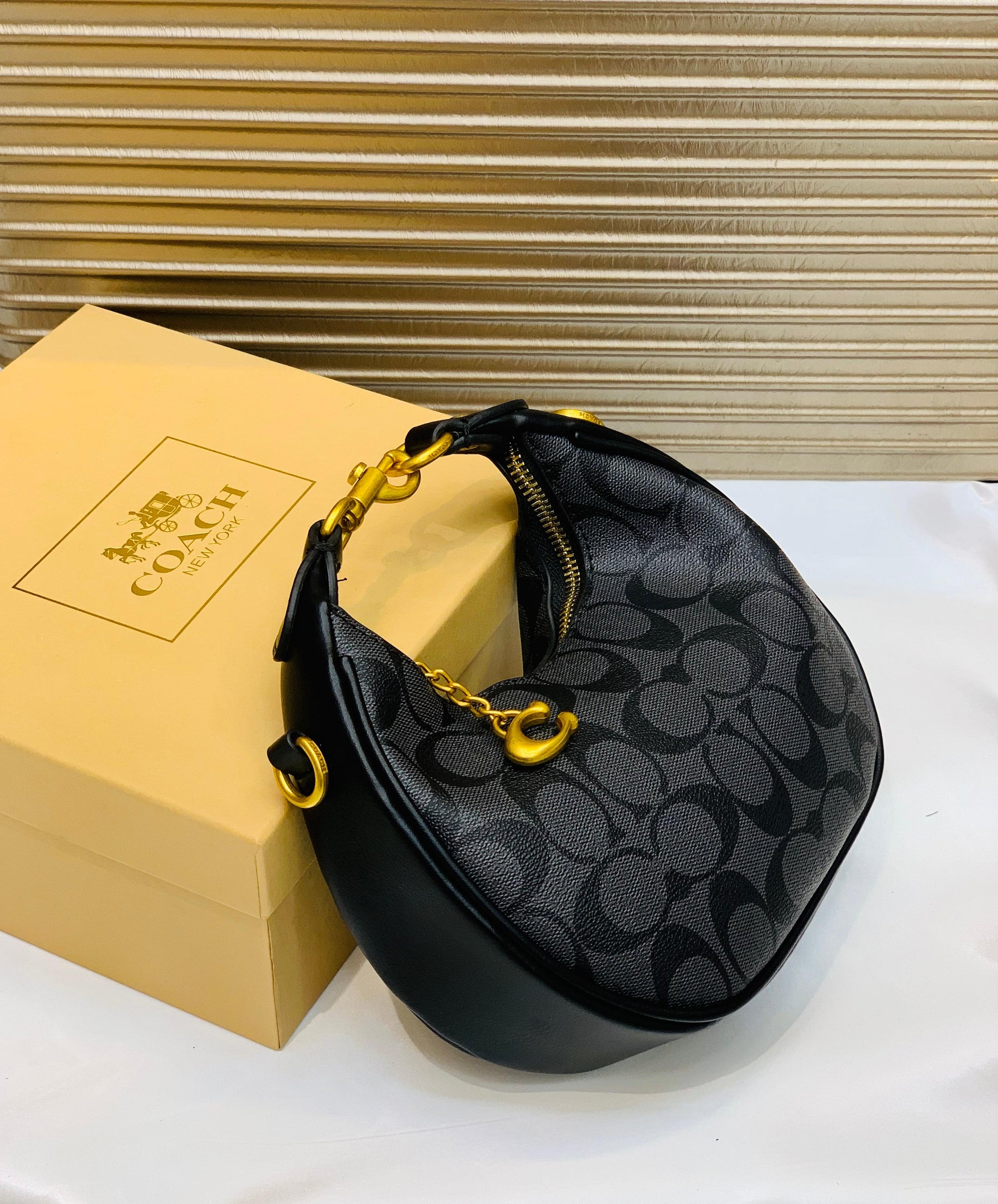 COACH MOON SHAPE CROSSBODY BAG