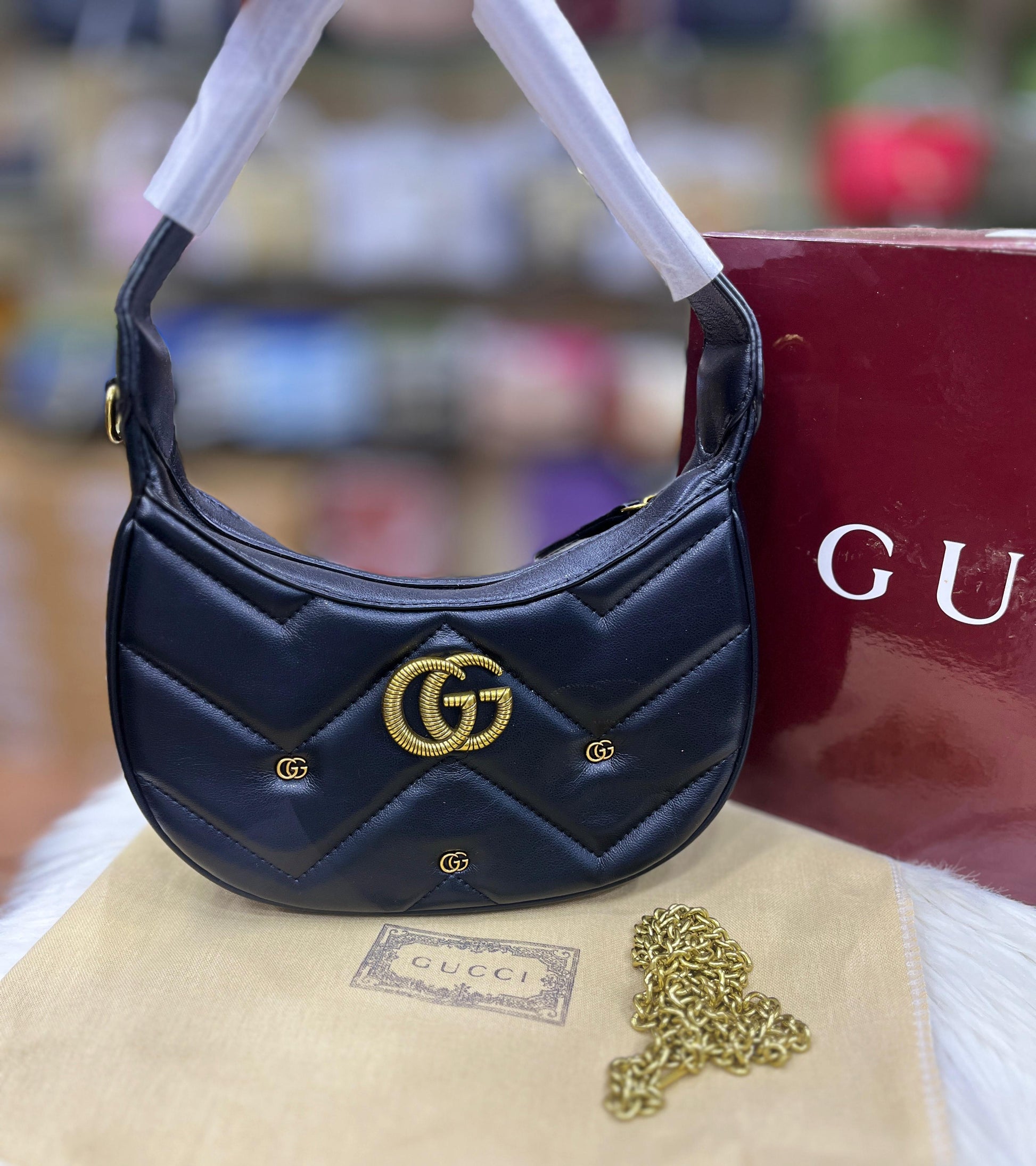 GUCCI GG MARMONT HALF-MOON SHOULDER BAG