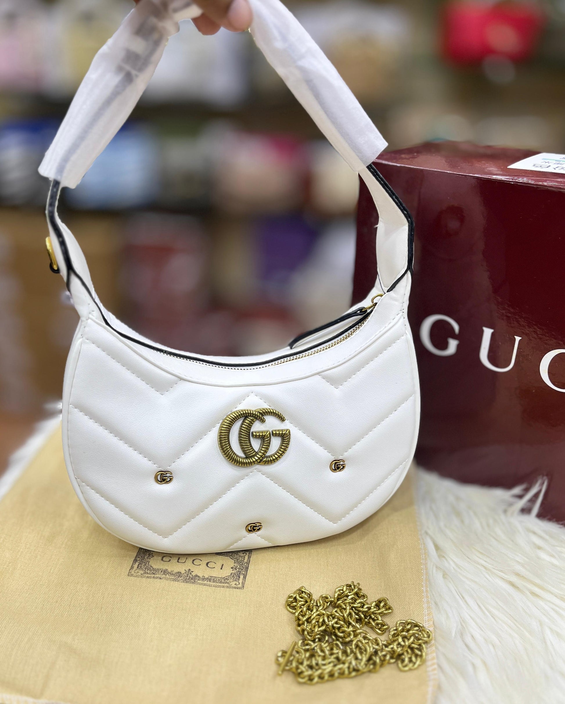 GUCCI GG MARMONT HALF-MOON SHOULDER BAG